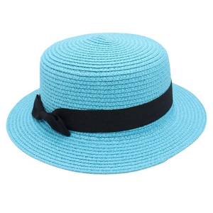 Close-up of light blue straw hat featuring spiral woven texture and black ribbon bow