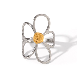 Detailed macro view of two-tone open flower ring with silver petals and golden center
