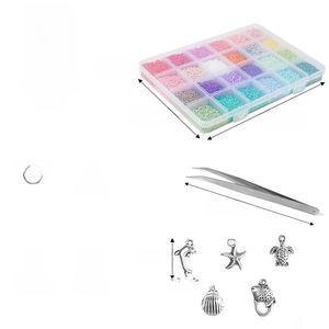 Detail view of 24-grid bead kit with elastic string, tweezers, and nautical metal charms