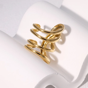 Minimalist spiral layered open ring in polished warm gold finish on a geometric base