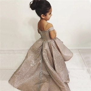 Champagne sequin tulle girl ball gown with off-shoulder design and long elegant train