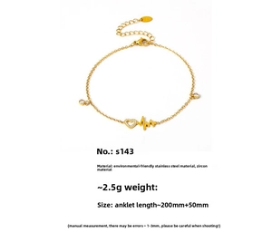 Detailed view of golden stainless steel anklet with zircon heart and heartbeat pulse wave charm
