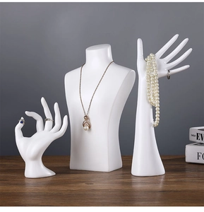Three-piece set of white matte resin jewelry displays with bust and hand models