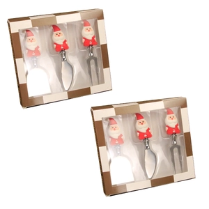 Close-up of a 3-piece Santa Claus cheese knife set with stainless steel blades in box