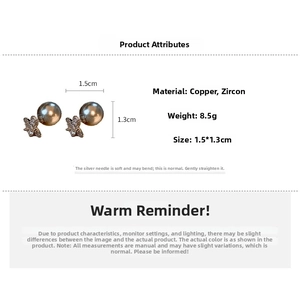 Detail specifications of zircon pearl Saturn earrings showing size 1.5x1.3cm and 8.5g weight