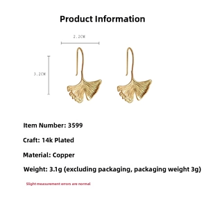 Detail showing 14K gold plated ginkgo leaf earrings dimensions 2.2x3.2cm on white background