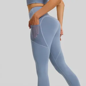 High waist yoga leggings in morandi blue with side mesh pockets and lifting effect