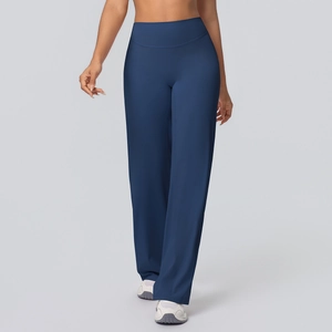 Detail of high waisted wide leg yoga pants in dark blue fabric with professional fit