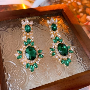 Vintage emerald oval earrings with gold-plated base and sparkling pavé rhinestones