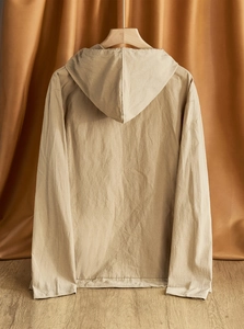 Back view of a beige linen cotton hoodie shirt showing natural texture and relaxed fit