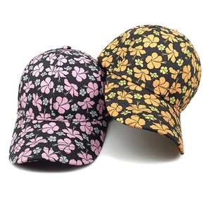 Set of two floral baseball caps with tropical hibiscus print and curved brim for women