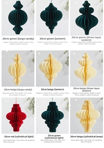 Detailed view of honeycomb paper Christmas tree ornaments in red, beige and dark green