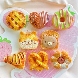 Variety of miniature resin bread and pastry charms for DIY crafts and phone case decor