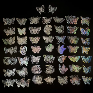 Detailed view of 100pcs holographic laser butterfly stickers with vintage moon and flower patterns