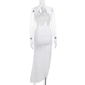 Detailed close-up of white bubble textured fabric on backless slim fit maxi dress
