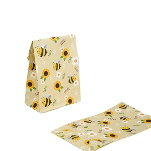 Mini paper gift bag with cute cartoon bee and sunflower patterns for party favors