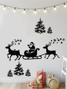 Stickers muraux silhouettes noires de Noël avec Père Noël et rennes sur un mur blanc pur