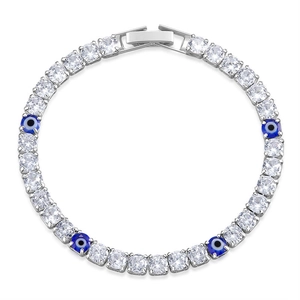 Detail of silver tennis bracelet with white zircons and blue evil eye charms in round layout