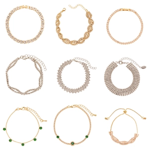 Minimalist geometric zircon bracelets in gold and silver plating with green accents