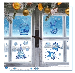 Blue Christmas window stickers with reindeer and snowflakes on a decorated wooden frame