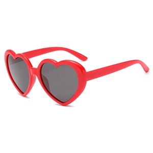 Chic red heart shaped polarized sunglasses with dark lenses shown from a 45-degree angle