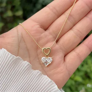 Elegant 18K gold plated copper heart necklace with sparkling clear crystal pendant set