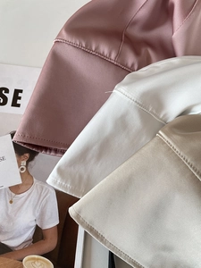 Close-up of premium satin texture and sewing detail on various colored sun hats