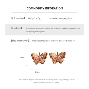 Detailed view of gold plated butterfly earrings with pink zircon and S925 silver posts
