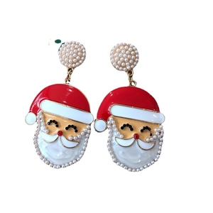 Christmas Santa Claus earrings with pearls and enamel finish on white background
