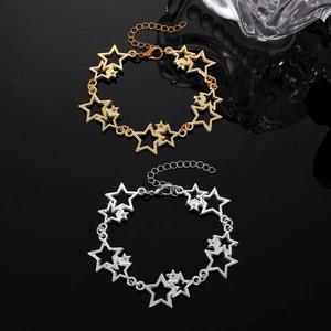 Bracelet à breloques étoiles ajourées en or et argent avec fermoir mousqueton réglable chic