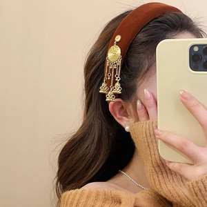 Brown velvet headband with golden fringe tassels in a neo-Chinese ethnic style