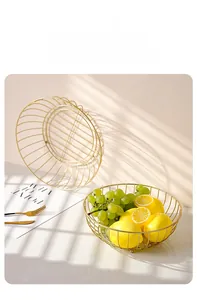 Close-up of golden iron fruit baskets with high-temperature paint finish and sleek wires
