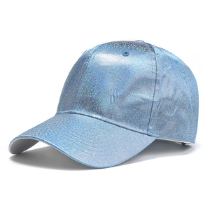 Close-up of light blue baseball cap featuring a metallic shimmer and glitter finish fabric