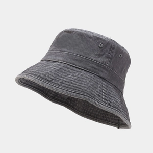 Detail of multi-row stitching on the brim and air holes of a washed canvas bucket hat