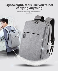 Detail of light gray business backpack with external USB port and waterproof fabric