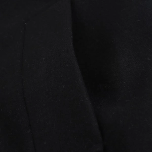 Elegant black wool coat with warm knitted fabric texture and detailed pocket stitching