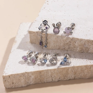 Silver stainless steel stud earrings set with zircon hearts and animals on stones