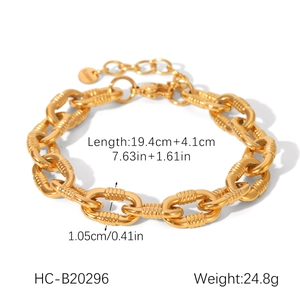 Macro shot of 18K gold plated thick chain bracelet with textured oval links and sizing data