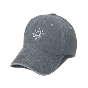 Retro grey washed cotton baseball cap featuring white sun embroidery on white background