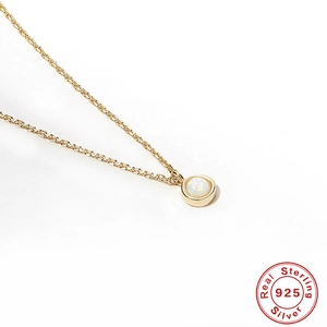 Minimalist S925 sterling silver opal pendant necklace with a gold chain for women