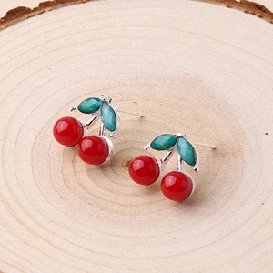 Fashionable cherry stud earrings with 3D red fruit and green leaves on wood base
