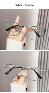 Detail of cat-eye silver metal frames with transparent anti-blue light flat lenses
