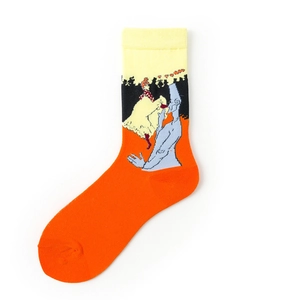 Detailed view of orange crew socks featuring artistic character knit illustrations