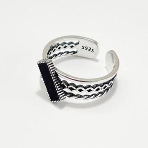 Vintage 925 sterling silver open ring with rectangular black resin and embossed details