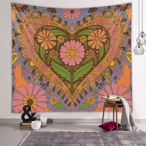 Vintage floral heart tapestry wall hanging for cozy room decor over a small table