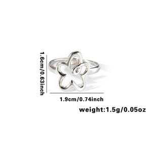 Detail of silver hollow flower ring with precise dimensions 1.9cm and 1.5g weight