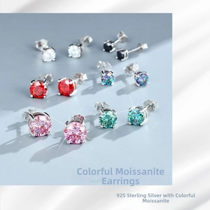 Detail of 925 sterling silver moissanite studs with S925 hallmark and four-prong setting