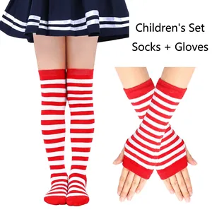 Close-up of red and white striped knit long socks and fingerless gloves set for children