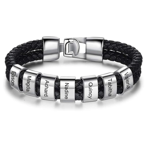 Macro shot of custom stainless steel beads with names on double-layer black braided leather band
