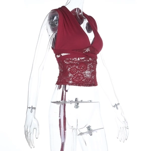 Detail of burgundy V-neck lace tank top showing side lace-up design and floral mesh fabric